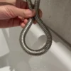 flexible de douche plié